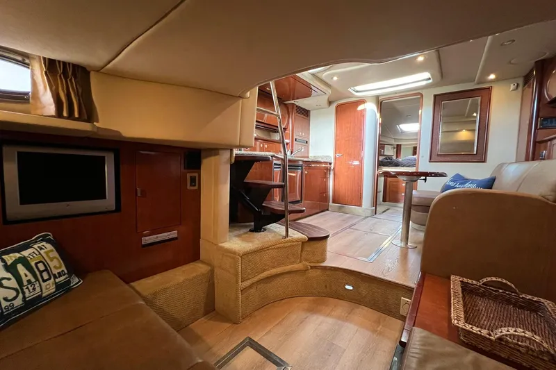 Slide: The Image of Luxurious interior of 2005 Sea Ray 390 Sundancer yacht with cozy seating and modern amenities. - 31