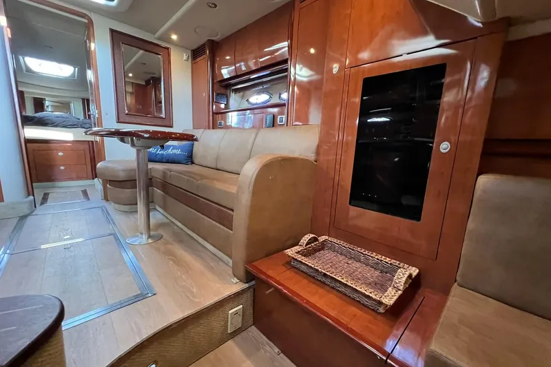 Slide: The Image of Luxurious interior of 2005 Sea Ray 390 Sundancer yacht with elegant wood finishes. - 36