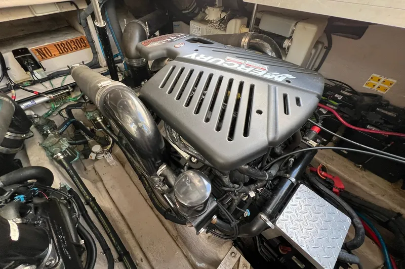 Slide: The Image of Engine compartment of a 2005 Sea Ray 390 Sundancer with MerCruiser engine. - 61