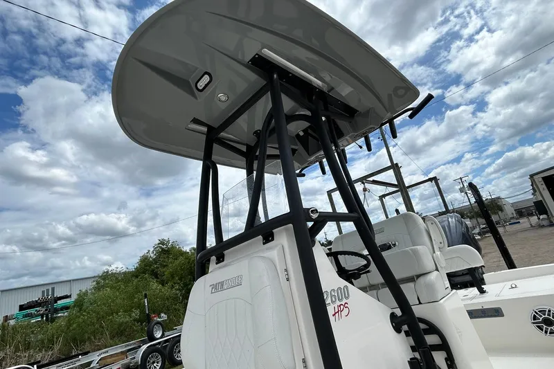 Slide: The Image of 2023 Pathfinder 2600 HPS boat with T-top under a cloudy sky. - 6