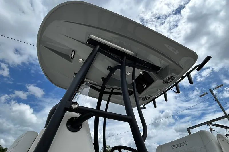 Slide: The Image of 2023 Pathfinder 2600 HPS boat T-top against a cloudy sky background. - 7