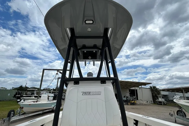 Slide: The Image of 2023 Pathfinder 2600 HPS boat with T-top under cloudy sky. - 8