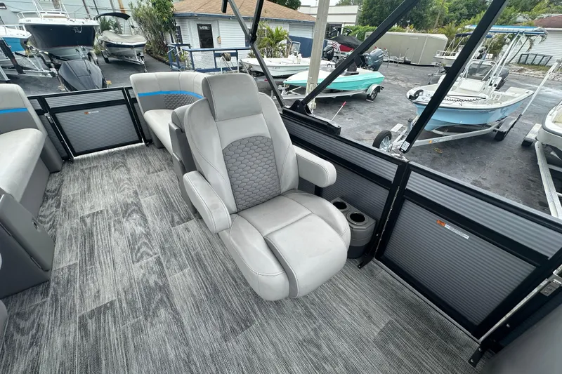 Slide: The Image of 2022 Qwest LTZ 824 boat interior with gray seating and modern design. - 17