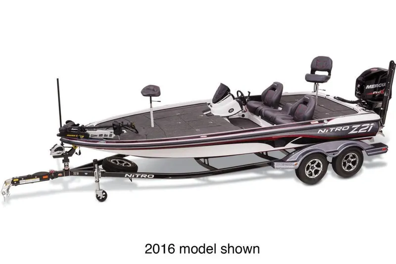 Slide: The Image of Manufacturer Provided Image: 2017 Nitro Z21 Pro bass boat, side view, on trailer, with dual seats and motor. - 11