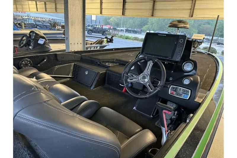 Slide: The Image of 2017 Nitro Z21 Pro boat interior with steering wheel and navigation system. - 4