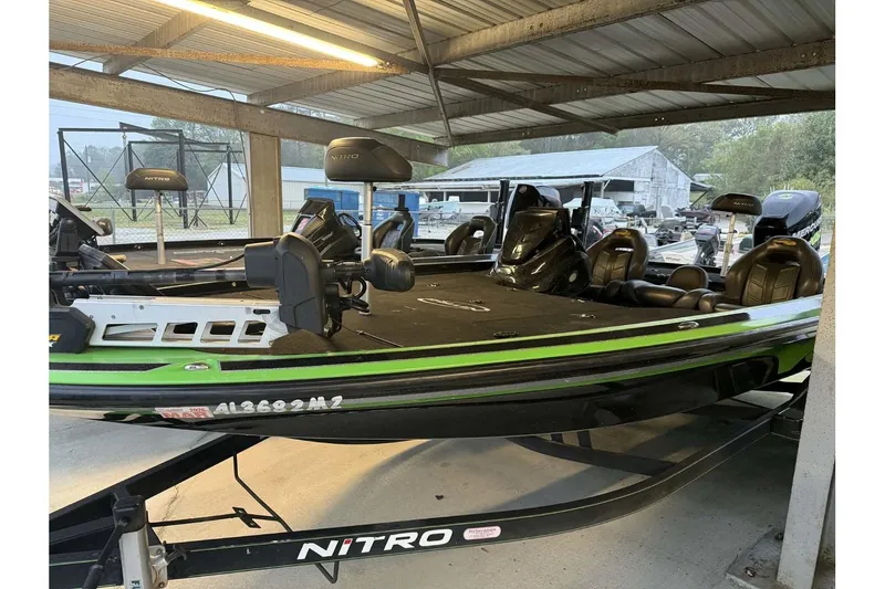 Slide: The Image of 2017 Nitro Z21 Pro bass boat in a covered storage area. - 6