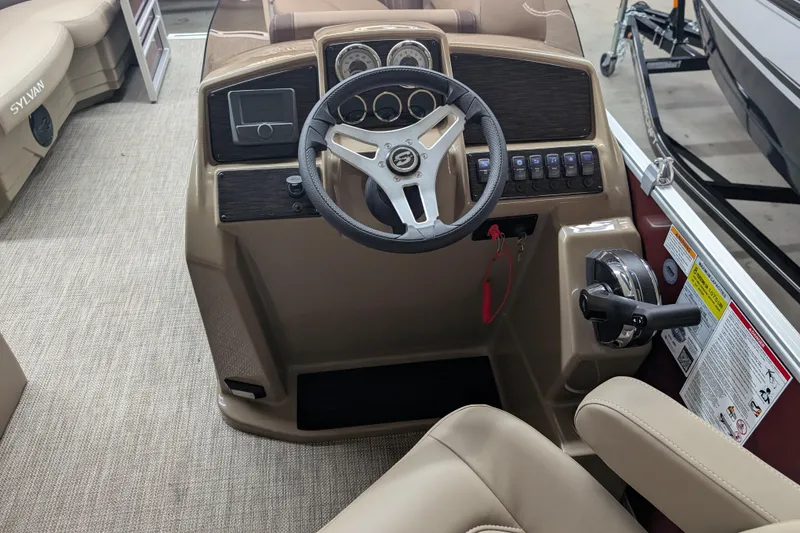 Slide: The Image of Steering console of 2026 Sylvan Mirage 818 Cruise pontoon boat with modern controls. - 8