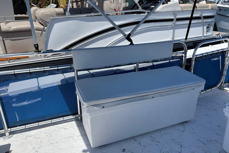 Slide: The Image of White bench seat on A&M Manufacturing Salty boat, 2021 model, with blue accents. - 33