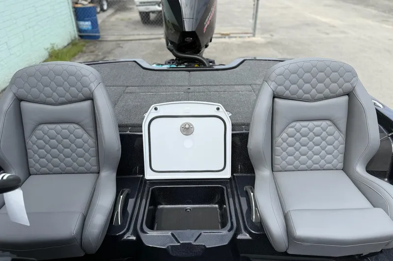 Slide: The Image of Two gray cushioned seats on a 2026 iKon vls20 boat deck. - 12