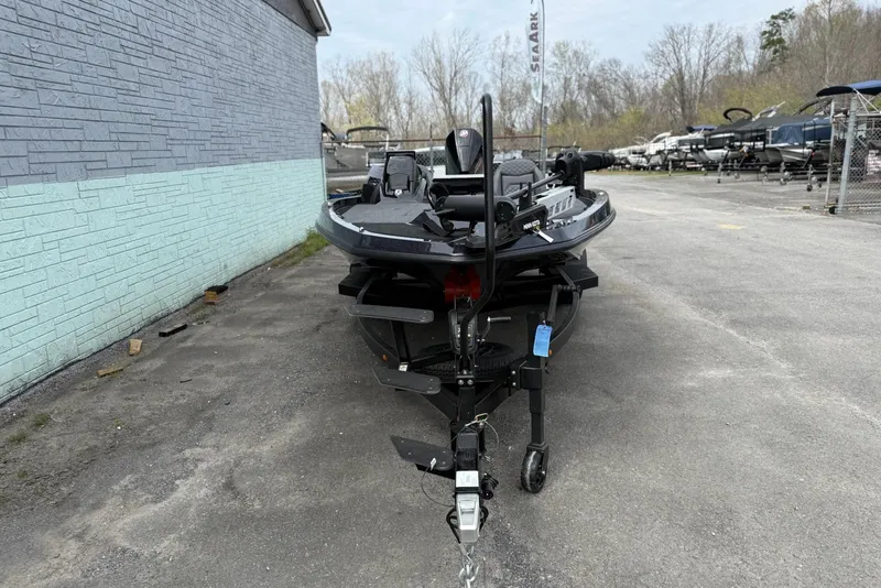 Slide: The Image of Front view of a 2026 iKon vls20 boat on a trailer in a parking lot. - 3