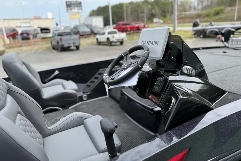 Slide: The Image of Interior of 2026 iKon vls20 boat with Garmin navigation system and sleek seating. - 6