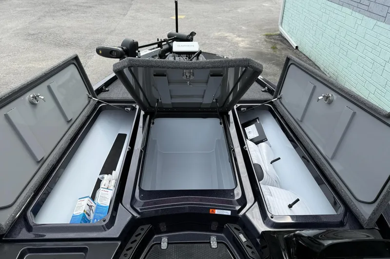 Slide: The Image of Open storage compartments on a 2026 iKon vls20 boat, showcasing ample space and organization. - 9