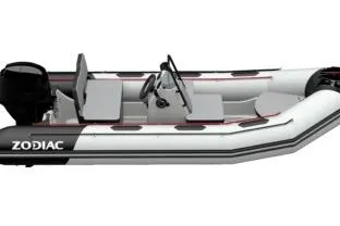 Slide: The Image of 2023 Zodiac Open 4.2 inflatable boat, side view, featuring sleek design and modern seating. - 11