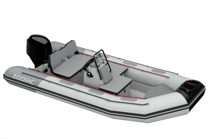 Slide: The Image of 2023 Zodiac Open 4.2 inflatable boat with seating and steering console. - 17