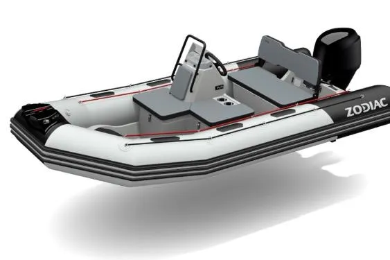 Slide: The Image of 2023 Zodiac Open 4.2 inflatable boat with console and seating, side view. - 8