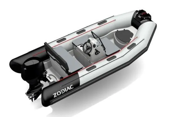Slide: The Image of 2023 Zodiac Open 4.2 inflatable boat with steering console and outboard motor. - 9