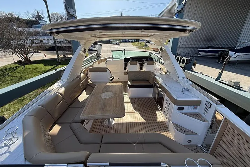 Slide: The Image of Luxurious 2023 Sea Ray SLX 400 yacht interior with spacious seating and elegant design. - 12