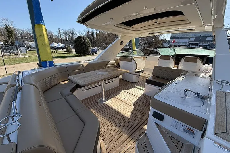 Slide: The Image of Luxurious 2023 Sea Ray SLX 400 yacht interior with spacious seating and elegant design. - 13