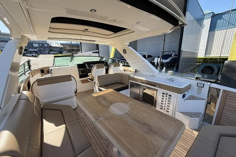 Slide: The Image of Luxurious 2023 Sea Ray SLX 400 yacht interior with spacious seating and modern amenities. - 16