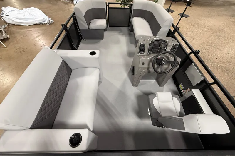 Slide: The Image of 2026 Angler Quest 7515 Leisure Quest Cruise boat interior with modern seating and steering console. - 3