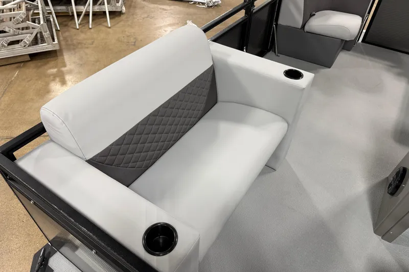 Slide: The Image of 2026 Angler Quest 7515 Leisure Quest Cruise boat interior with cushioned seating and cup holders. - 8