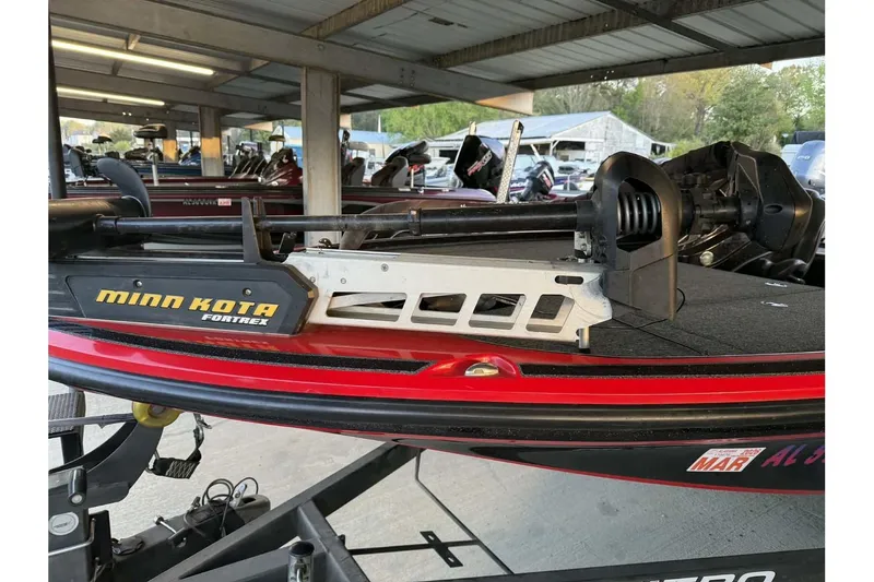 Slide: The Image of 2020 Nitro Z18 boat with Minn Kota Fortrex trolling motor in a covered area. - 9