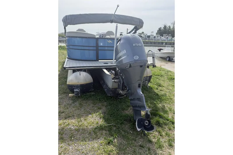 Slide: The Image of 2018 Starcraft SLS 3 pontoon boat with Yamaha 150 outboard motor. - 1