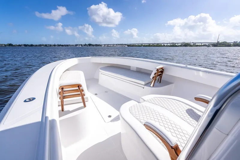 Slide: The Image of 2024 Bahama 41 boat interior with luxurious seating on a sunny day. - 29