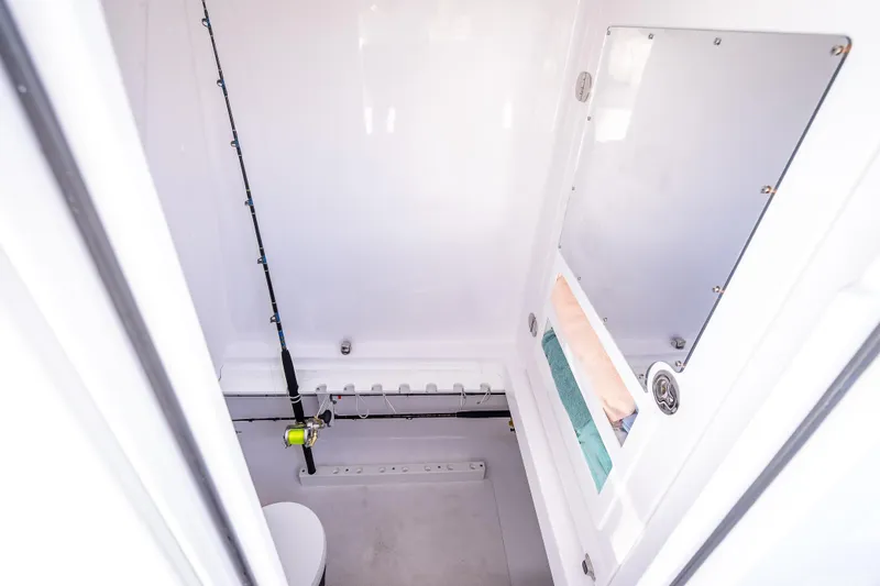 Slide: The Image of Interior of 2024 Bahama 41 boat featuring fishing rod storage and compact design. - 50
