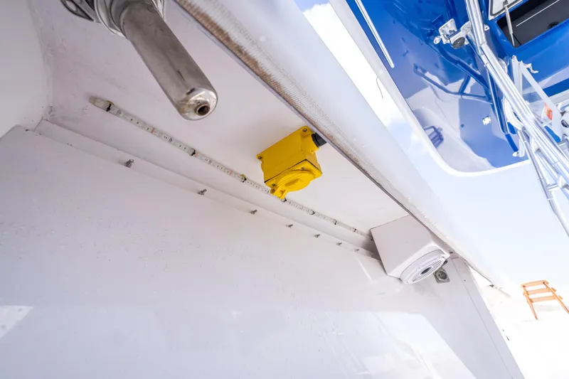 Slide: The Image of 2024 Bahama 41 boat detail showing equipment and fixtures under the deck. - 55