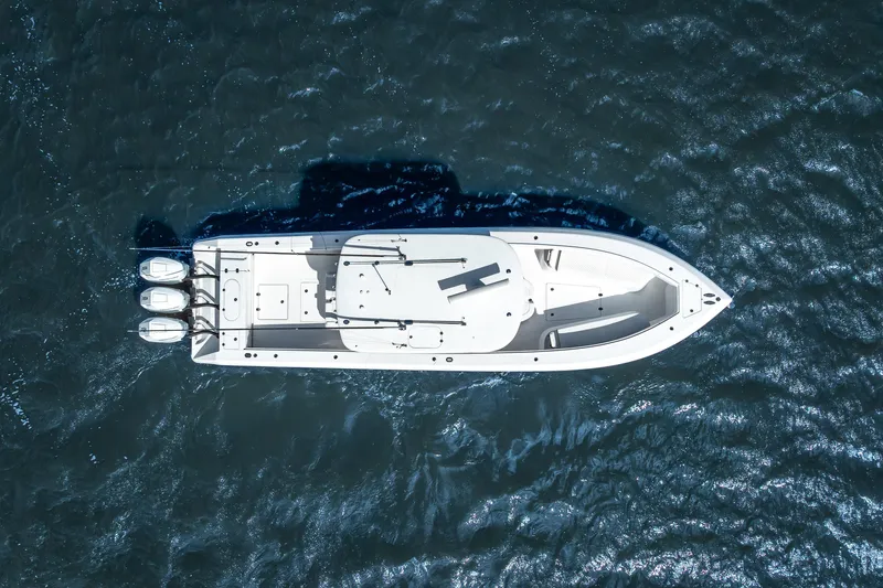 Slide: The Image of Aerial view of 2024 Bahama 41 boat on open water. - 56