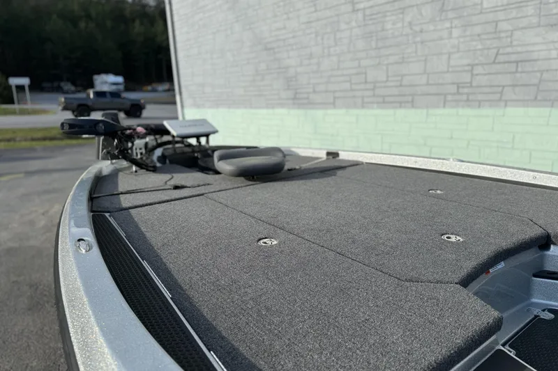 Slide: The Image of 2026 iKon VLX21 boat deck with gray carpet and mounted equipment. - 6