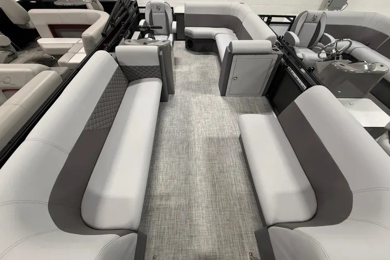 Slide: The Image of 2026 Angler Quest 818 Panfish Cruise interior with gray seating and modern design. - 13