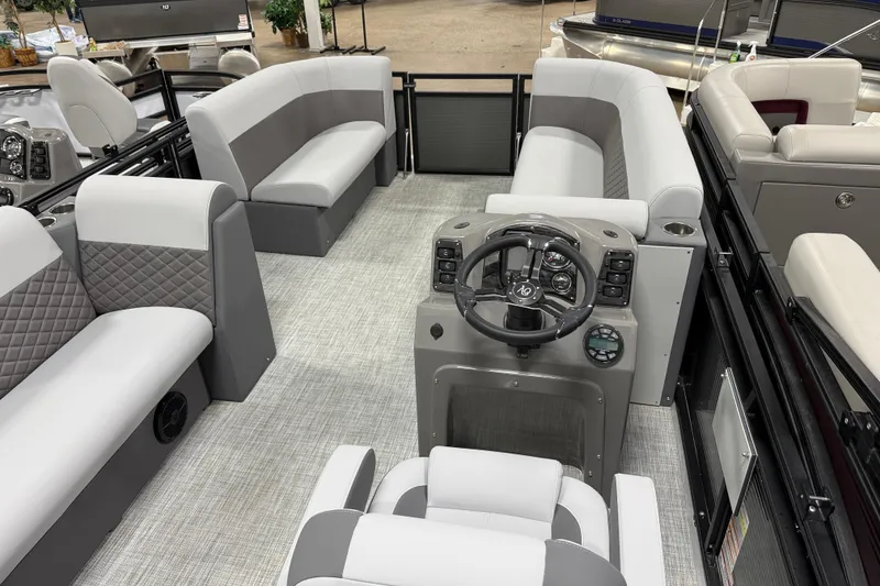 Slide: The Image of 2026 Angler Quest 818 Panfish Cruise interior with modern seating and steering console. - 3