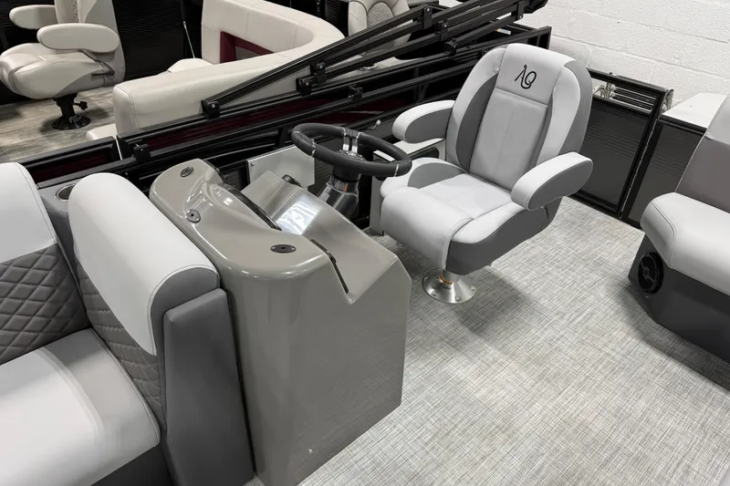 Slide: The Image of 2026 Angler Quest 818 Panfish Cruise boat interior with modern seating and steering console. - 6