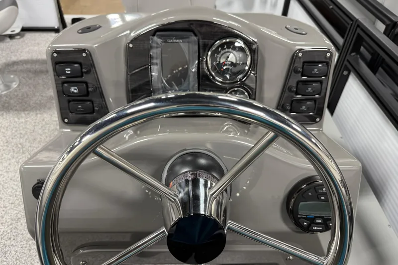 Slide: The Image of Steering console of 2026 Angler Quest 816 Panfish boat with controls and gauges. - 10