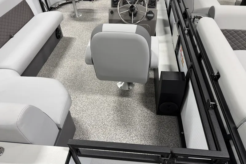 Slide: The Image of 2026 Angler Quest 816 Panfish boat interior with modern seating and steering console. - 4
