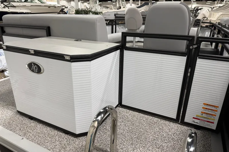 Slide: The Image of 2026 Angler Quest 816 Panfish boat interior with seating and storage. - 5