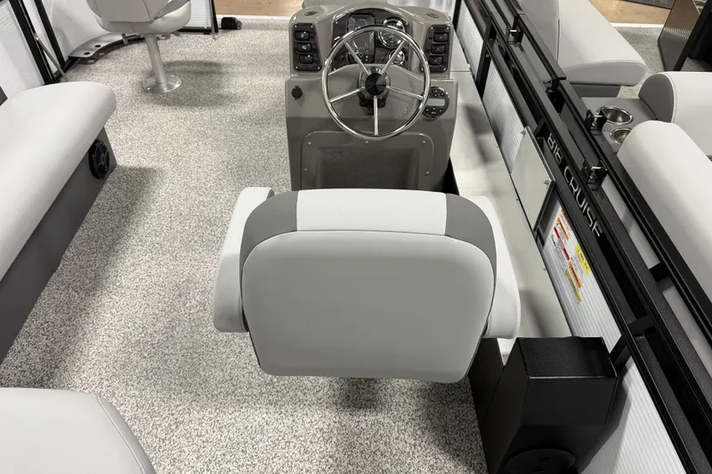 Slide: The Image of 2026 Angler Quest 816 Panfish boat interior with steering console and seating. - 6