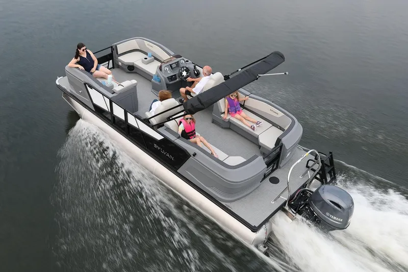 Slide: The Image of Manufacturer Provided Image: 2026 Sylvan A-Series 22 LZ DH Sport pontoon boat cruising on water with passengers. - 10