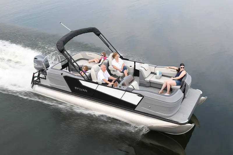 Slide: The Image of Manufacturer Provided Image: 2026 Sylvan A-Series 22 LZ DH Sport pontoon boat cruising on calm water. - 11