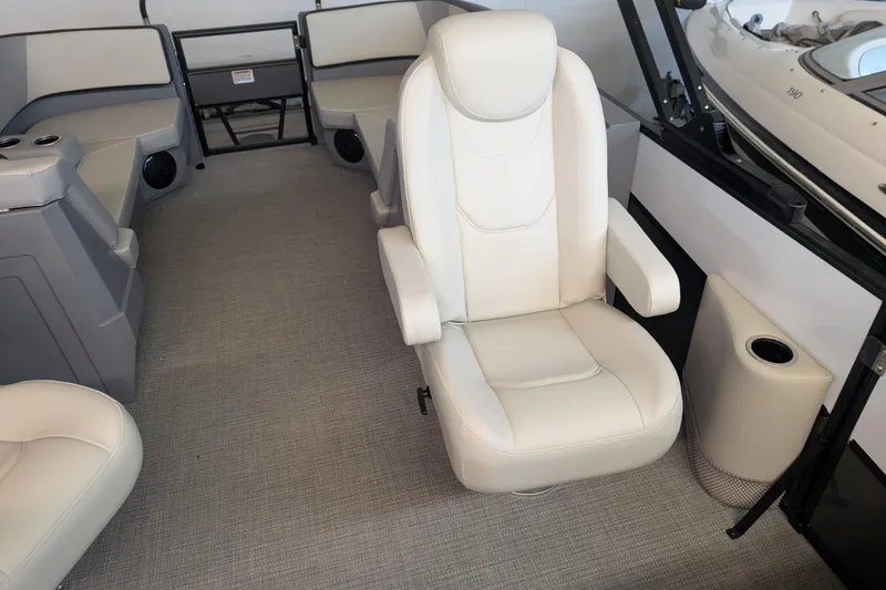 Slide: The Image of Interior of 2025 Sylvan A-Series 22 LZ DH Sport boat with plush seating. - 3