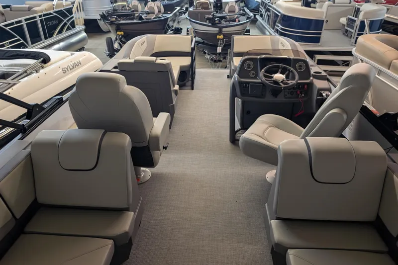Slide: The Image of Interior of 2025 Sylvan A-Series 22 LZ DH Sport pontoon boat with modern seating. - 9
