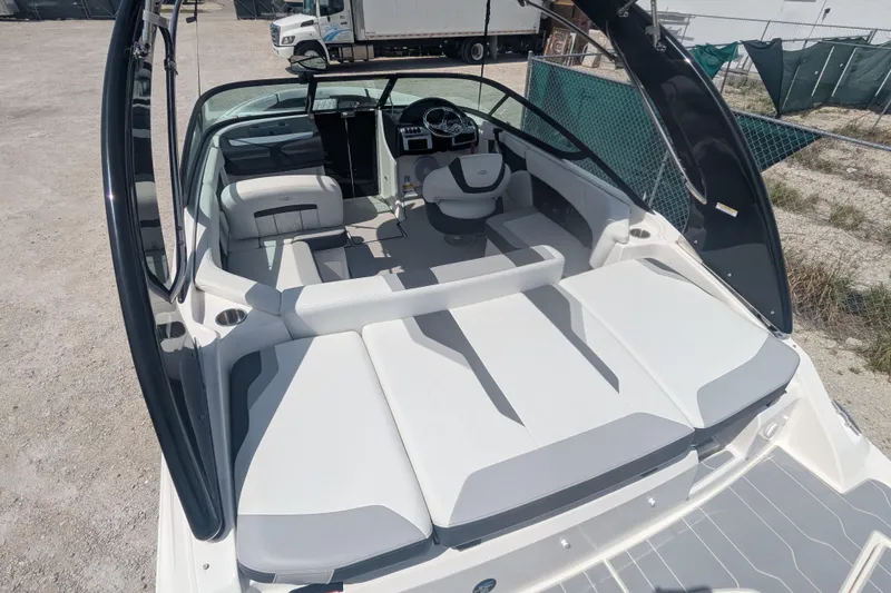 Slide: The Image of 2025 Regal 21 OBX boat interior with spacious seating and modern design. - 8