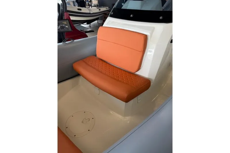 Slide: The Image of Orange seating on 2026 Brig Eagle 5 boat, showcasing modern design and comfort. - 3