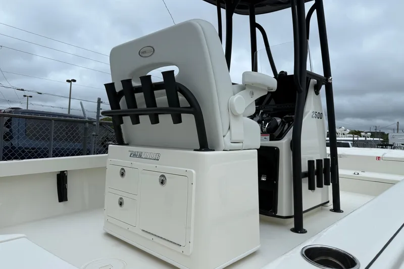 Slide: The Image of 2026 Pathfinder 2500 Hybrid boat interior with seating and storage compartments. - 3