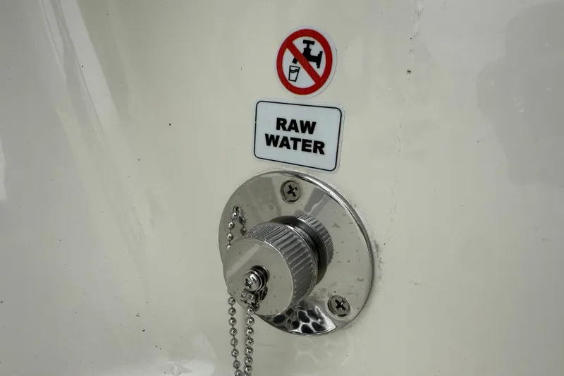 Slide: The Image of Pathfinder 2500 Hybrid 2026 raw water inlet with warning label. - 4