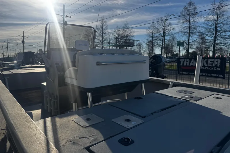 Slide: The Image of Custom Charles Leonard 21 boat, 2004 model, with sunlit deck and Lowrance equipment. - 14