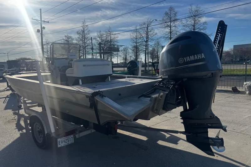 Slide: The Image of Custom Charles Leonard 21 boat with Yamaha engine on trailer, sunny day, 2004 model. - 5
