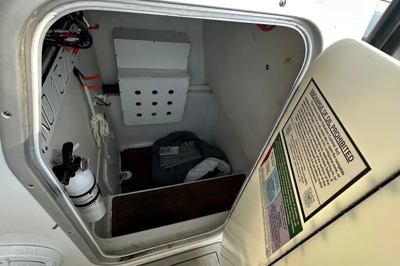 Slide: The Image of Storage compartment of a 2017 Cape Horn 32 T boat with safety equipment. - 12